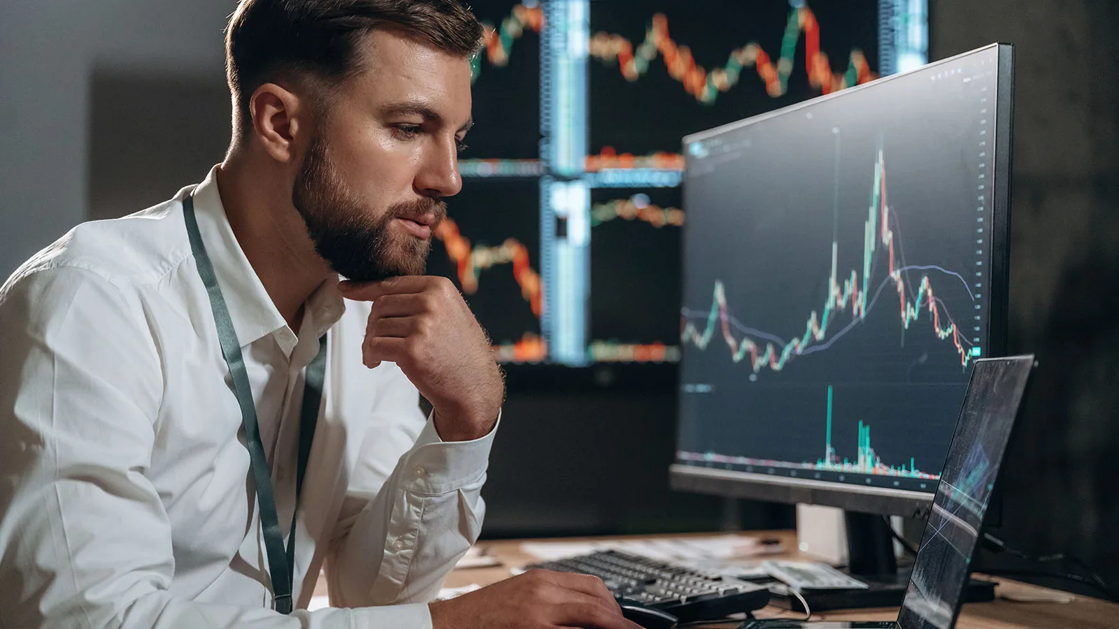 A man is closely watching his investments